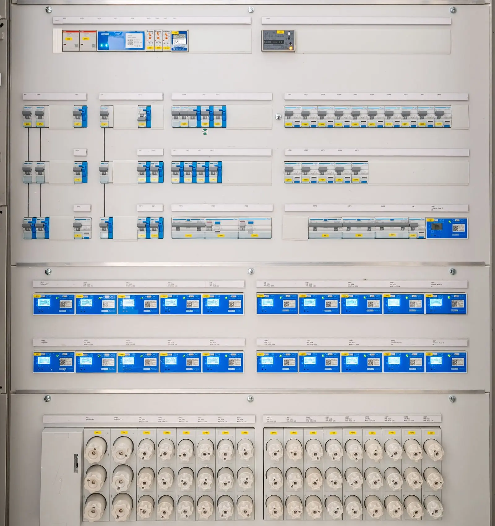 Rows of circuit breakers in an electrical panel