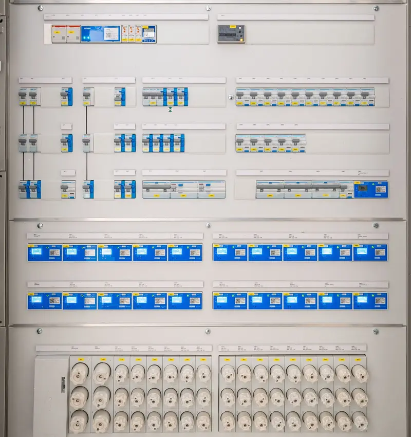 Rows of circuit breakers in an electrical panel