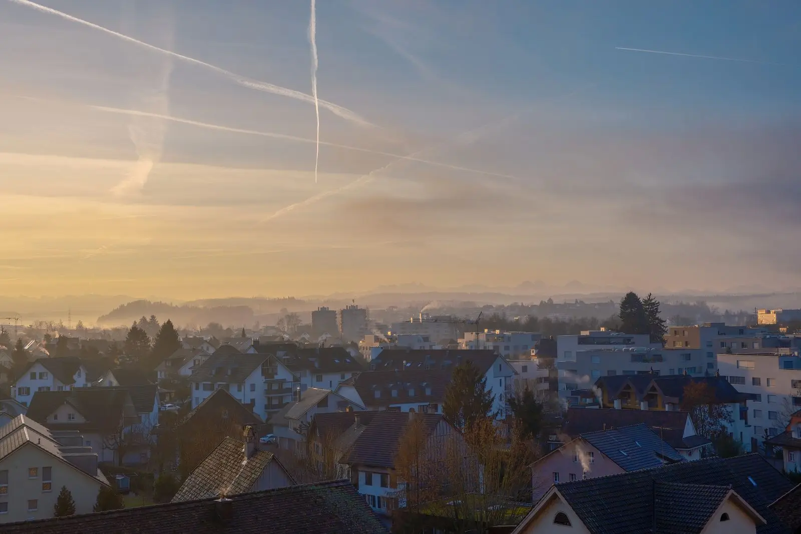 Morning light over the roofs of a small town
